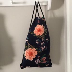 A triangl drawstring bag